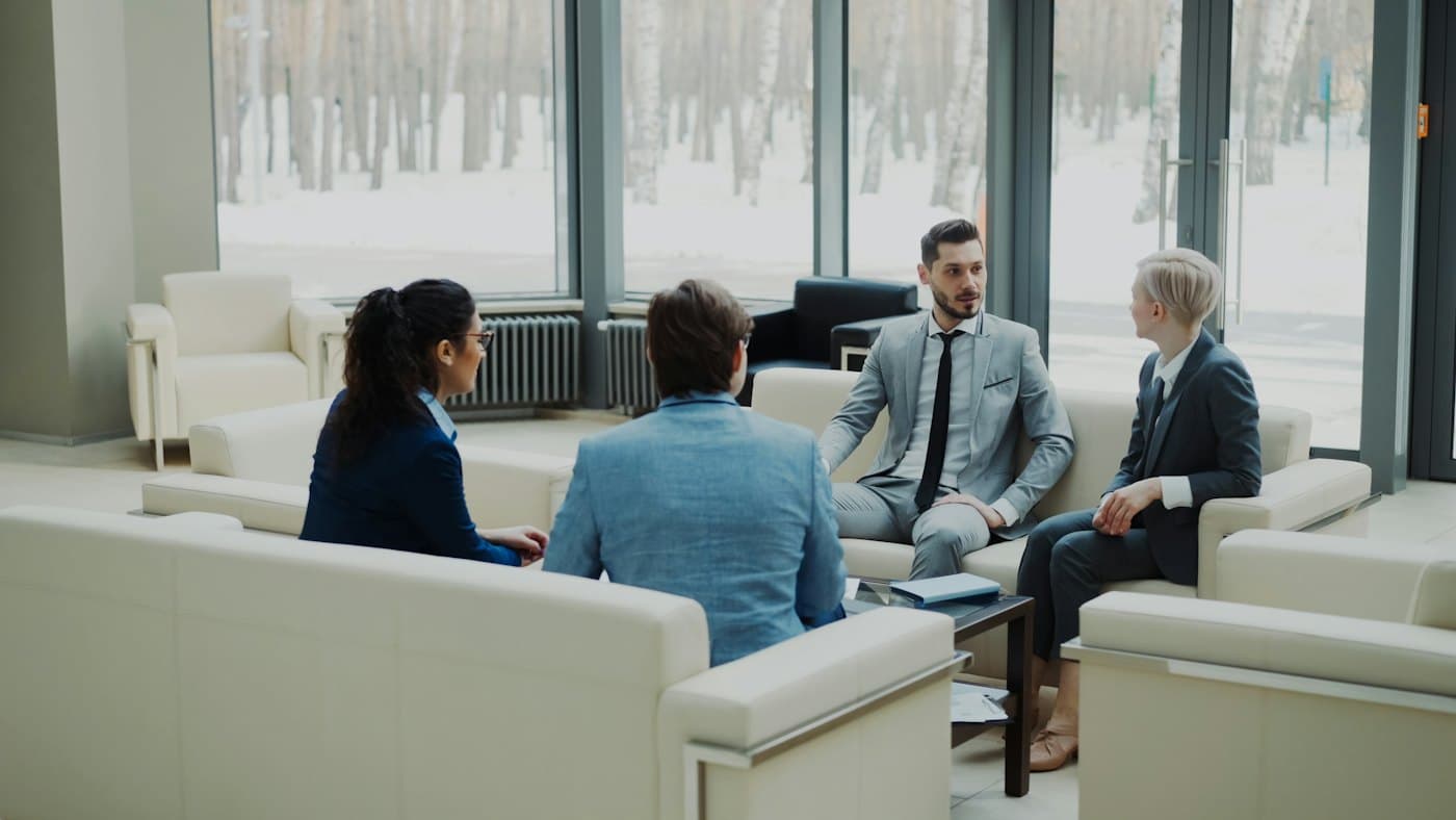 Advisors meeting with a client