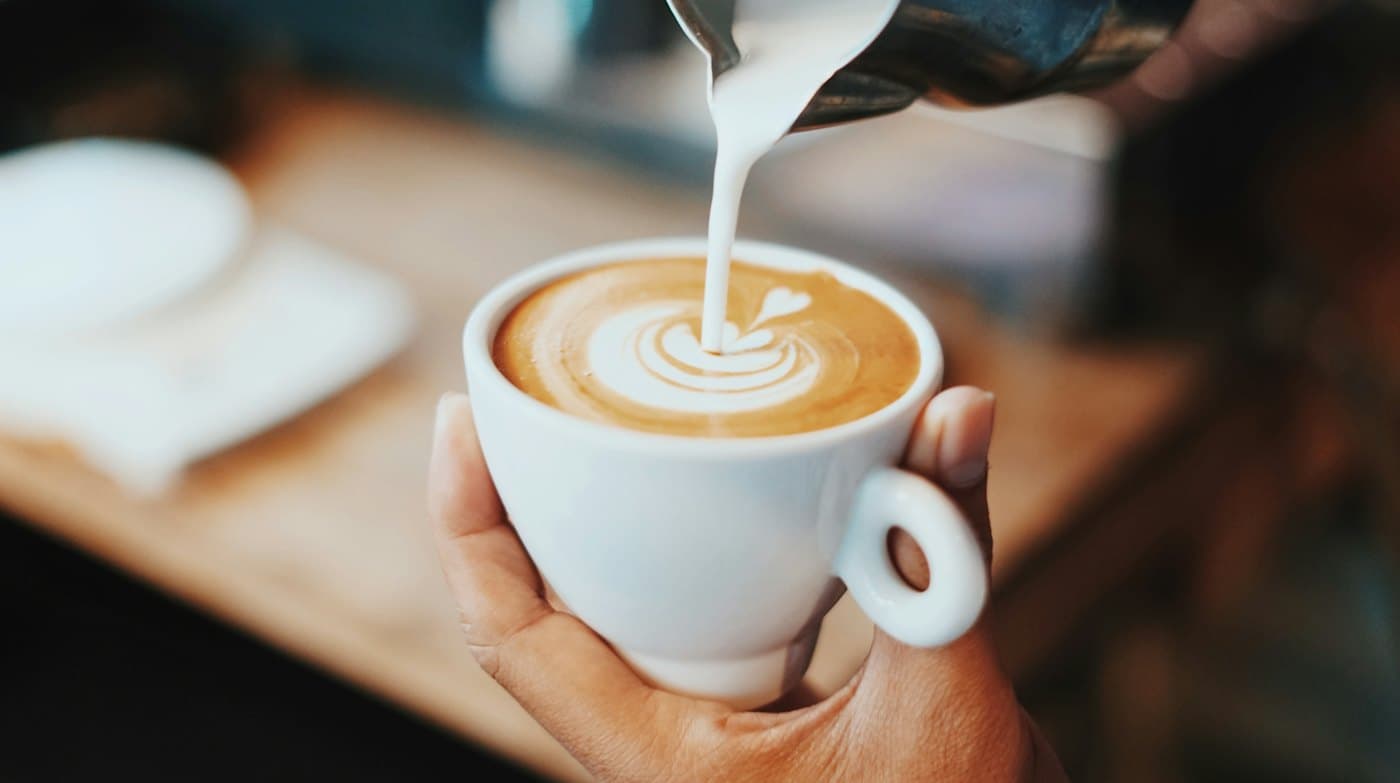 Latte being poured